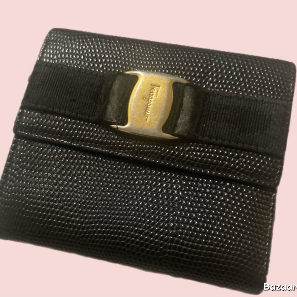 55D.  Leather wallet, Salvatore Ferragamo Vara Ribbon
Compact Bifold Gold Buckle